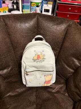 Primark Winnie the Pooh Cream Mini Backpack.  Brand new with tags